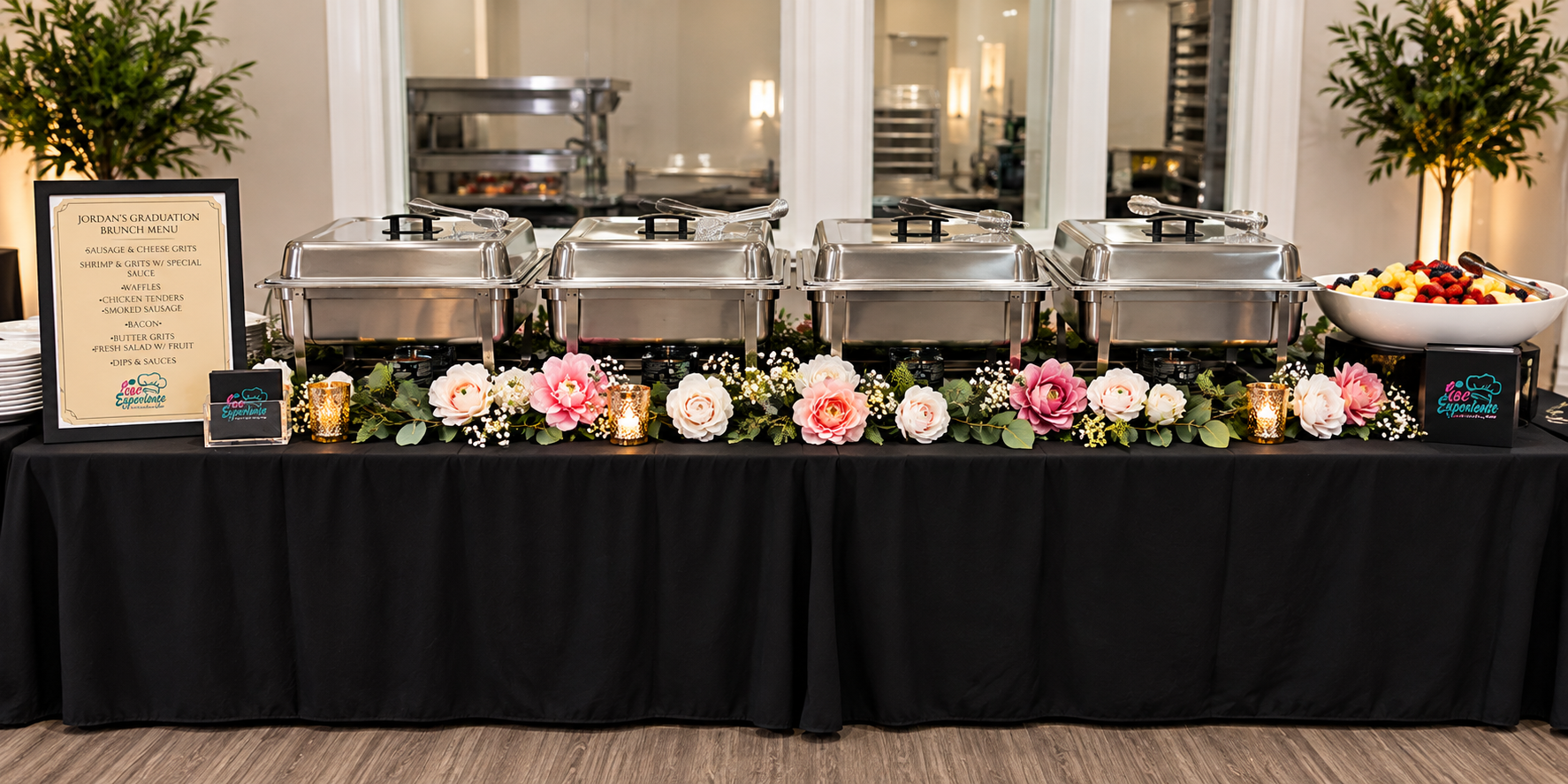 C&C Experience brunch buffet line decorated with floral garland and candles