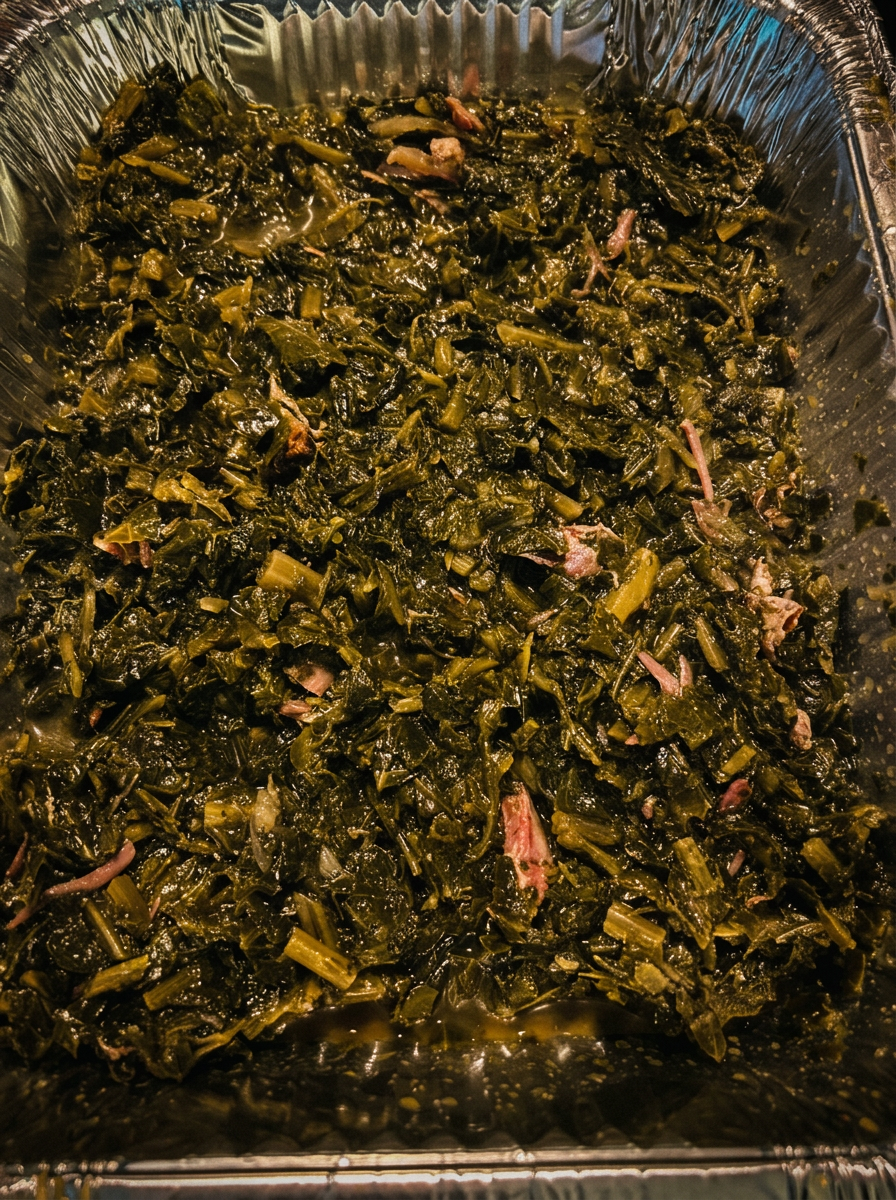 Southern collard greens with smoked turkey in a catering pan